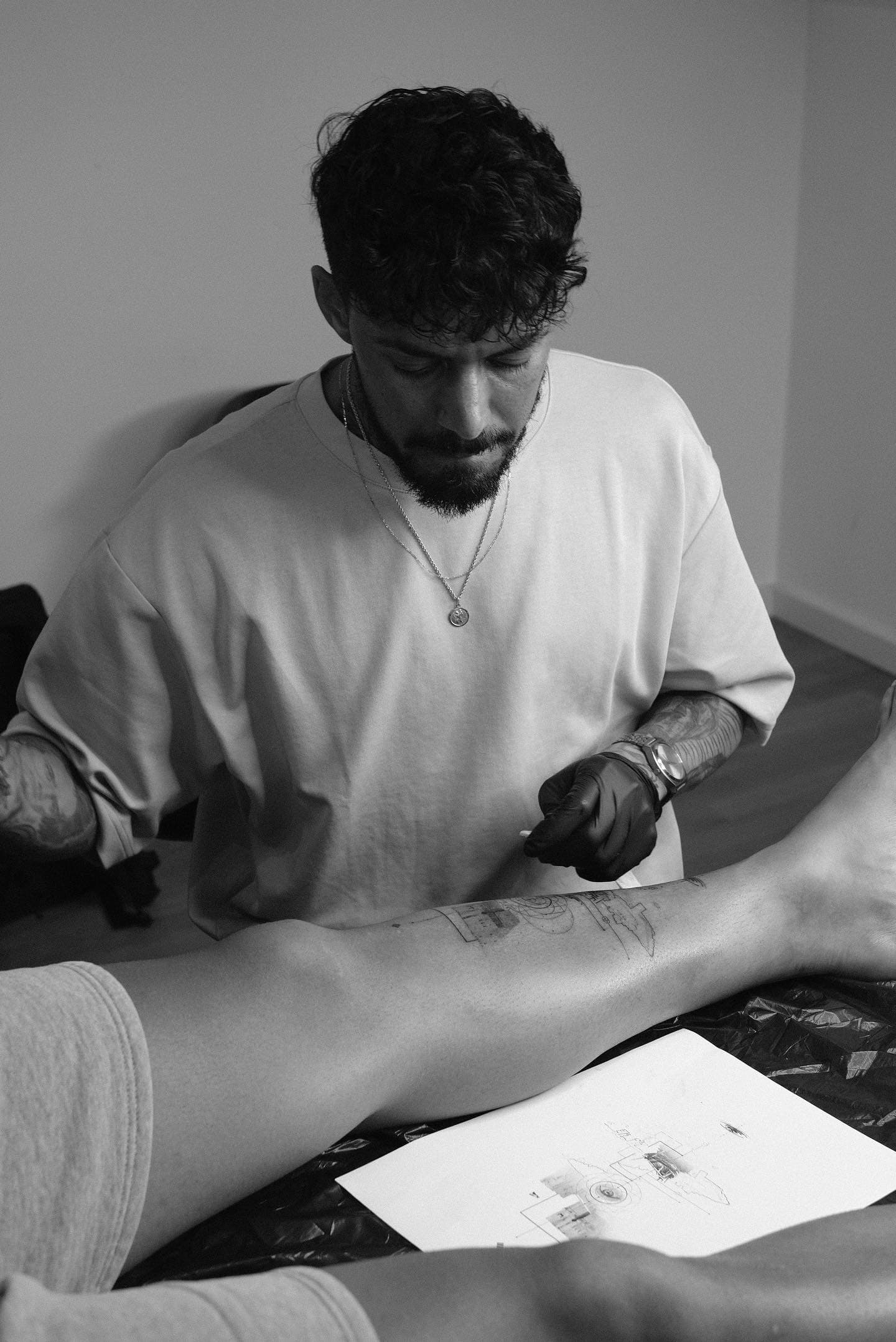 Ted doing a tattoo